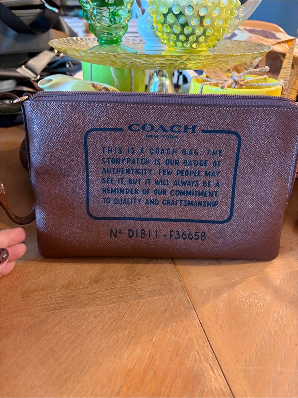 Coach Brown Leather Wristlet with Black Logo Print